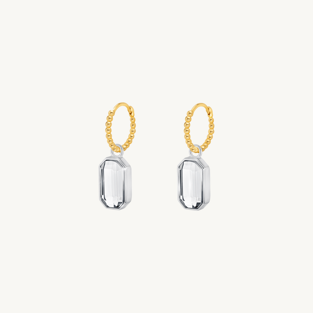 Two toned earrings with baguette cut charms by Misia Mae